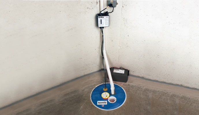 sump pump system installed in a basement