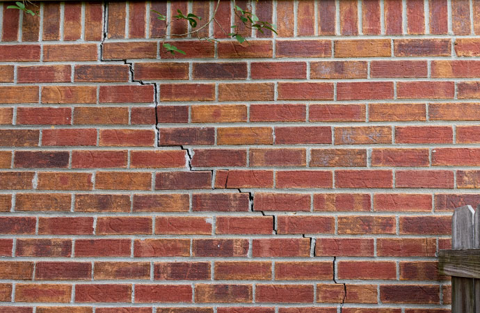 Cracks on a brick wall