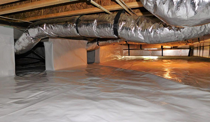 Insulation installed in crawl space for better energy efficiency.