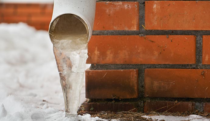 Close up view of frozen discharge lines