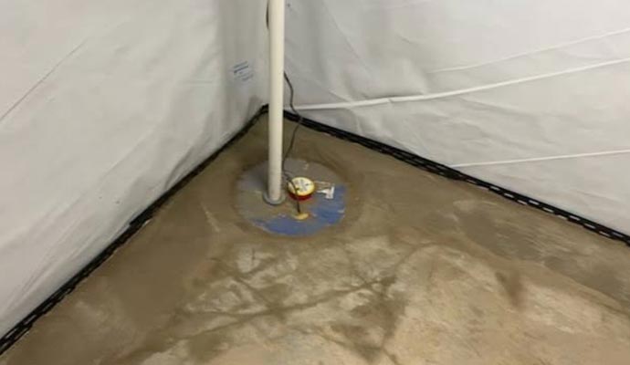 Sump pump installed in a crawl space
