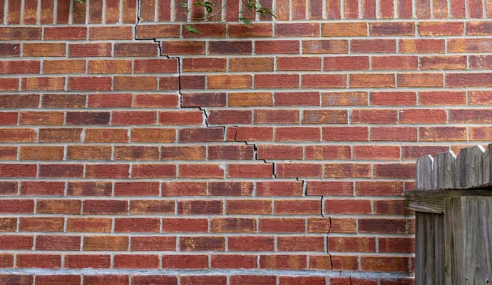 a crack on the brick wall
