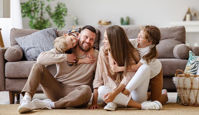 Happy family enjoying fresh indoor air Happy family enjoying fresh indoor air