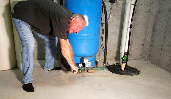 Sump pump maintenance service in progress